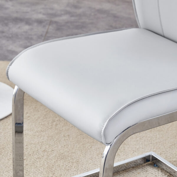 c57eec11d9d14761991633742bbe1443_62512cea0cf5191cc628469965ffef13 Table and chair set.63"*35.4" White Imitation Marble Pattern MDF Dining Table Set - 4 Soft and Comfortable Light Gray PU Chair With Arched Metal Silver Leg.Create Your Exclusive Low-Key Luxury Space.