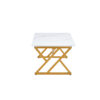 A coffee table made of rock slab material, with a smooth and natural surface that complements the modern design of the golden metal legs, making it suitable for living rooms of all sizes.47*23.6
