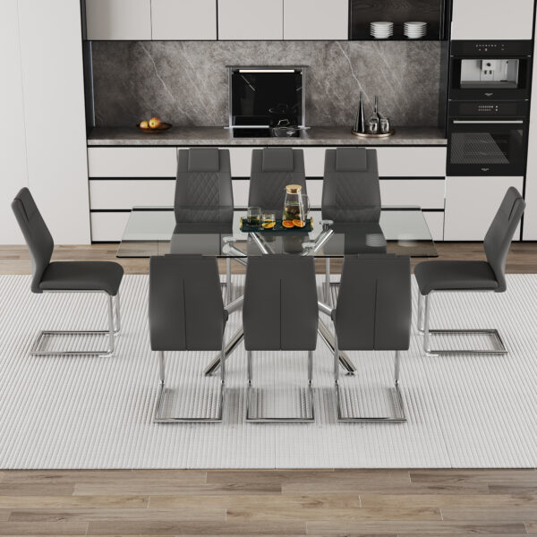 c6a8c59c1e024c6a93357796eedb4462_c6b335afccff059630f818d59f735c0d Table and chair set.Modern Luxurious Transparent Tempered Glass Dining Table Set with 8 Chairs.Single fork silver metal table legs.Dark gray high-quality PU dining chairs with silver metal legs.