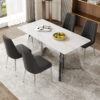 Table and chair set.63"x31.5x30" Luxurious Snow Mountain Patterned Sintered Stone Table with Silver Metal Butterfly Legs.Paired With 4 Black Chairs With Silver Metal Legs.Modern Light Luxury.