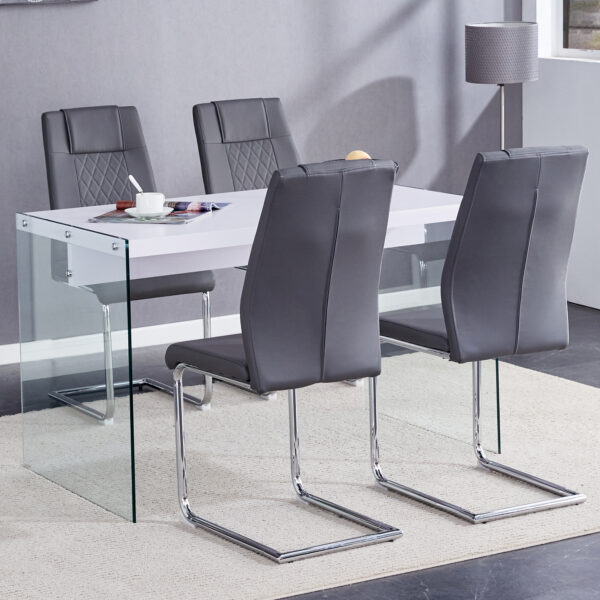 c75a0b5c35f148d0a12233cd6ca935a4_5dfa8cbd71b91907040e40f77d6c64ae Table and chair set.White MDF Coffee Table - Reinforced with Tempered Glass Legs.Paired with 4 Dark Gray high-quality PU chairs with silver metal legs.