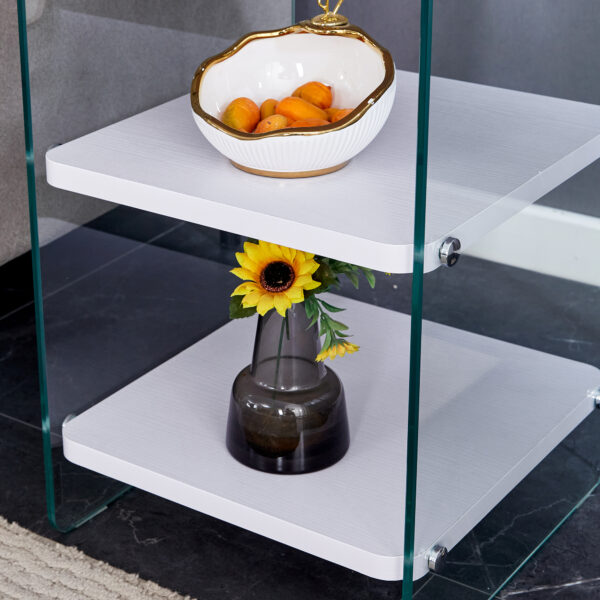 c7af20844c494a1fb811afb8d6bba3b2_b15d1fac4d2d0bfc8ae3ed7f9255cb8e Three levels of bedside tables. The board surface is MDF, with white stickers, and both sides are transparent tempered glass. The design is simple and generous, with storage function.