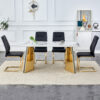 Table and chair set.63"x31.5x30" Luxurious Cold Jade Patterned Sintered Stone Dining Table with Golden Stainless Steel Butterfly Legs.Paried With 4 Black High-quality PU Chairs With Arched Metal Legs.