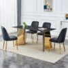 Table and chair set.63"x31.5x30"Black Texture With Lines Patterned Sintered Stone Table with Golden Stainless Steel Legs.Paried With 4 Black PU Chairs with Simple Line Designs On The Backrest.