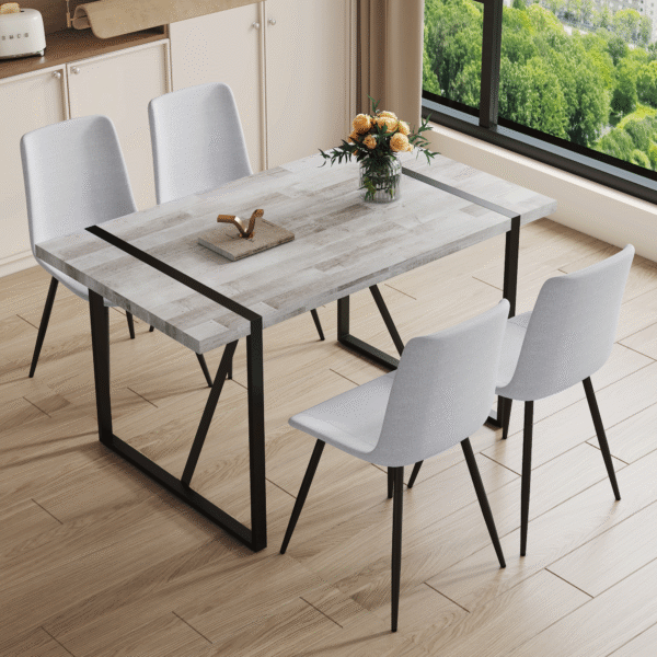 cb74e0a4664043ccb33b7ce7d7590ec5_9d8b305ada6ea0b58cfc2bfbd482798a Table and chair set.A minimalist retro rectangular dining table with a textured top and black metal legs.Paired With 4 Light Gray Linen-Cotton Dining Chairs With Curved Widened Cushion Design.