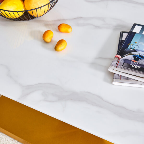 cc5de675bd334c5f8b03a480c03b1195_c1e7d5ab54b6f73eb8a19a5f6b305411 Modern minimalist coffee table. Tempered glass with stickers tabletop,golden MDF pillars. Suitable for living room and dining room