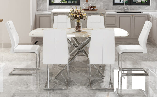 cd2d7cdfeaf24a16a3f2802e5b8734a0_df12bbd8aca204eec8b49343ab085a66 Table and chair set.Modern Luxurious white Marble-Patterned Tempered Glass Dining Table with 6 Chairs.Single fork silver metal table legs.White high-quality PU dining chairs with silver metal legs.