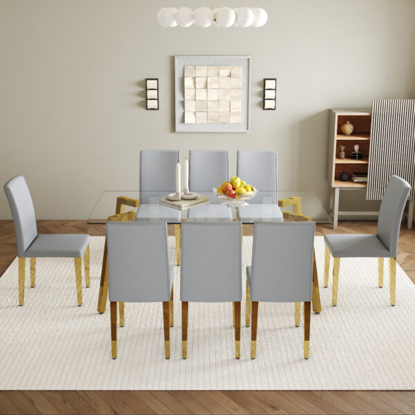 cdf6ce8239f144bd8ace18c7f96ea15e_cfc3b4451927acf851185e40c04fab3f Table and chair set.71 * 35.4 inch rectangular dining table.Tempered Glass Tabletop,Golden 7-shaped Metal Table Legs.Paried With 8 Light Gray PU dining chairs, Golden Metal Legs.Simple and versatile.