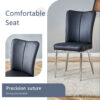 Table and chair set.63"x31.5x30" Black Marble-Patterned Slabs Tabletop with Stainless Steel Butterfly Legs.Paired with 6 Black PU dining chairs with a vertical stripe design on the backrest.