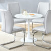 Table and chair set.Hourglass-Shaped Stable Small Round Table -31.9" * 31.9" With 4 Soft and Comfortable Light Gray PU Chair With Arched Metal Silver Leg.Create Your Exclusive Low-Key Luxury Space.