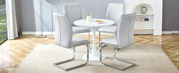 d07ec99207414ae386c782465e4d0a70_3e6e0a0ed4d0e1ae4e4ac5e29e024bc5 Table and chair set.Hourglass-Shaped Stable Small Round Table -31.9" * 31.9" With 4 Soft and Comfortable Light Gray PU Chair With Arched Metal Silver Leg.Create Your Exclusive Low-Key Luxury Space.