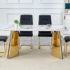 Table and chair set.63"x31.5x30" Luxurious Cold Jade Patterned Sintered Stone Dining Table with Golden Stainless Steel Butterfly Legs.Paried With 4 Black High-quality PU Chairs With Arched Metal Legs.