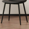 Table and chair set.79"x31.5" with X-shaped Black Metal Table Legs,Wood Grain Textured MDF Crossbeam.Paired With 8 Modern Mid-Century Style Upholstered Side Black PU Chairs.