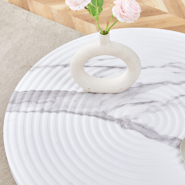 d5a81c259594434992d282e5c7ffc7b1_057e860765a99c4fcdb9a98e0666709b Table and chair set.31.5 Inch Elegant White Marble Pattern Round Dining Table - Suction Molding Annular Texture.Paired With 4 Black PU Chairs with Simple Line Designs On The Backrest.