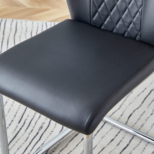 d9dd9d1bc19a44a982fded8e9768fd66_77206e3470edcffb355b9c69f0523738 Table and chair set.63"x31.5x30" Black Marble-Patterned Slabs Tabletop with Stainless Steel Butterfly Legs.Paried with 6 Black high-quality PU chairs with silver metal legs.