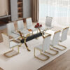 Table and chair set.Elegant Transparent Tempered Glass Dining Set - 71"x35.4" with 8 Light Gray PU Chairs with golden C-tube metal leg.X-shaped Golden Metal Table Legs,Black Textured MDF Crossbeam.