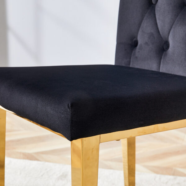 dc09eed2a4434e5ea977e959782dd0e4_aa74231f1c51a85c7df10c4ac277f3f0 2 piece dining chairs.The gold metal legs complement the black velvet, showcasing a perfect blend of modern and classic elements.Suitable for various occasions such as kitchens,conference rooms, etc.