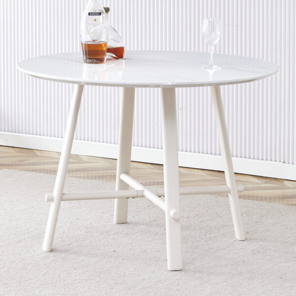 dc224220b7124547976dec604424c222_48bfc86e72e7cde47910feb26f9291bb A modern minimalist circular dining table with a 42 inch diameter white patterned tabletop and white metal legs. Suitable for restaurants, living rooms, and conference rooms.