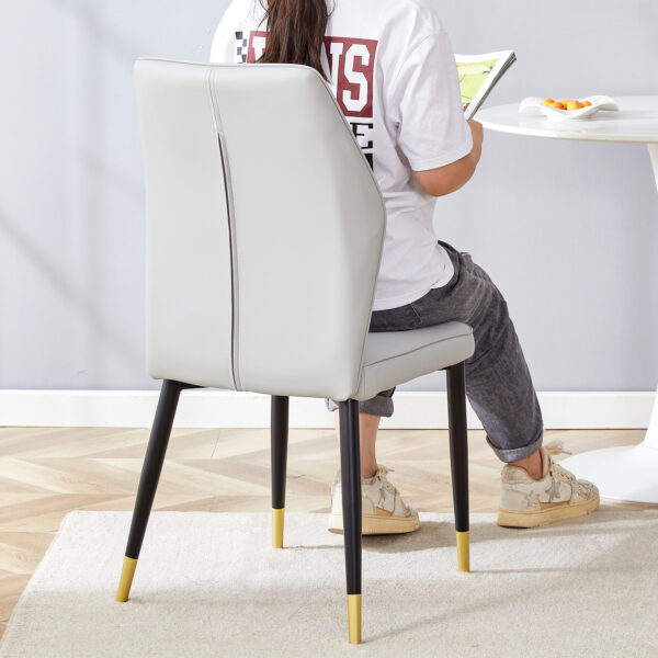 dc50d19325464014a316aa4c0af444f8_f9192be58006c4b3799b53496cc199bf 4 light gray modern dining chairs with stylish PU patterned backrest and black metal legs for a comfortable home experience in the kitchen, bedroom and office.