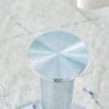 A 35-inch diameter glass top and a modern, minimalist round dining table with silver metal legs. Ideal for dining rooms, living rooms and meeting rooms.