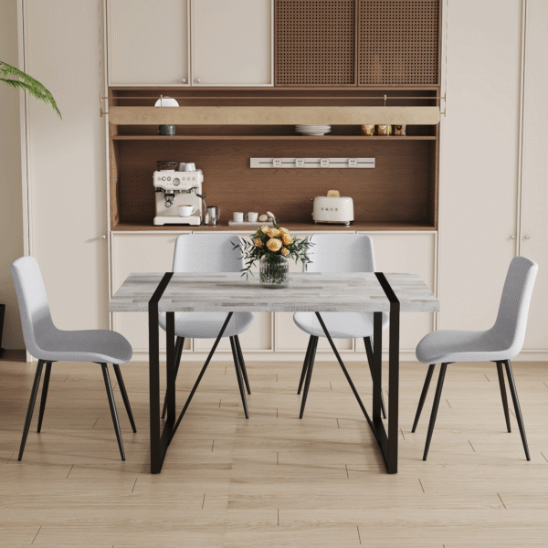 e0dc48cc59a14445aeefd0f456dbacac_6e996ffa1d9fd12d64ba7ddc0e6d9907 Table and chair set.A minimalist retro rectangular dining table with a textured top and black metal legs.Paired With 4 Light Gray Linen-Cotton Dining Chairs With Curved Widened Cushion Design.