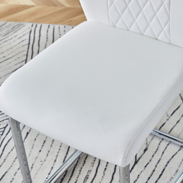 e3f6d4314d174ccf856c0944a09352f3_6ea5558f08bbfcf15e2461d5b7cfef29 Table and chair set.63"x31.5x30" Luxurious Snow Mountain Patterned Sintered Stone Table with Silver Stainless Steel Butterfly Legs.Paried With 6 White High-quality PU Chairs With Arched Metal Legs.