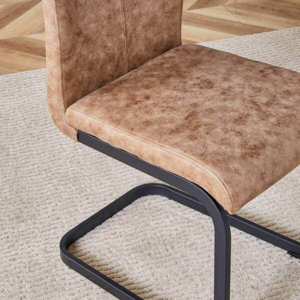 Table and chair set.A retro rectangular dining table with fishbone patterned MDF desktop and black metal legs.Paired With 6 Brown technology fabric chairs with Featuring arched black legs.