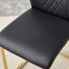 Table and chair set.63"x31.5x30" Luxurious Cold Jade Patterned Sintered Stone Dining Table with Golden Stainless Steel Butterfly Legs.Paried With 4 Black High-quality PU Chairs With Arched Metal Legs.
