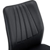 Four black dining chairs. A medieval modern chair made of PU material with soft cushions, equipped with golden metal legs. Suitable for restaurants and living rooms
