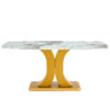A modern minimalist dining table. Imitation marbled glass tabletop. Gold MDF table legs for kitchen and living room