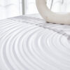 Table and chair set.31.5 Inch Elegant White Marble Pattern Round Dining Table - Suction Molding Annular Texture.Paired With 4 Black PU Chairs with Simple Line Designs On The Backrest.