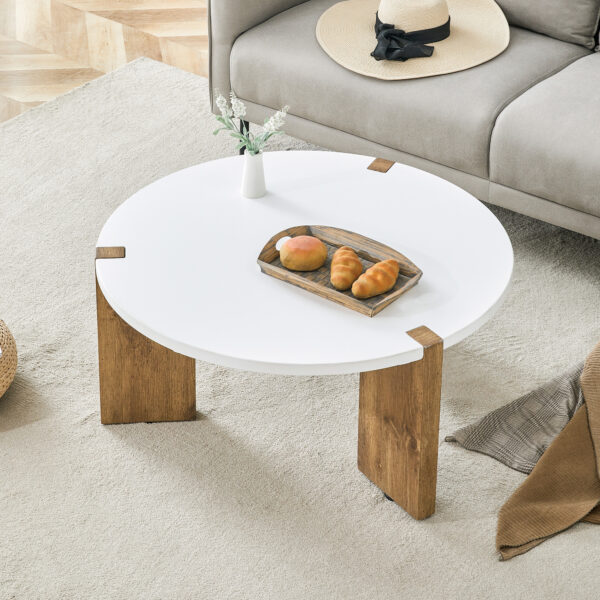 ea9df061fe35466bbb42270419e63a5e_f1f64e4f8758f7cc3eb7b9c6ddce171d 33.4-inch diameter minimalist circular MDF material coffee table, a stable and practical choice. The unique embedded design and the support of three table legs make the coffee table structure stable.