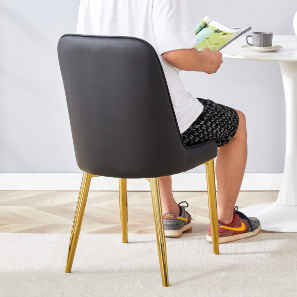 eb0eecfe3a35483cb4ec0556088b2469_6ec415f7a25cc3061155591ca2be7cb1 4 modern dining chairs, sleek PU leather backrest, and gold metal legs bring a comfortable home experience to the kitchen, bedroom, and office.