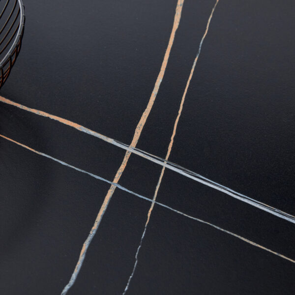 ed22076d92c4412ab08c768b31f53556_0b06198536a6920e95fde0ee018b3c55 63"x31.5x30" Black Marble-Patterned Slab Dining Table with Golden Stainless Steel Butterfly Legs.The tabletop is designed to be scratch and heat resistant.Slabs Tabletop,Golden Stainless Steels Legs.