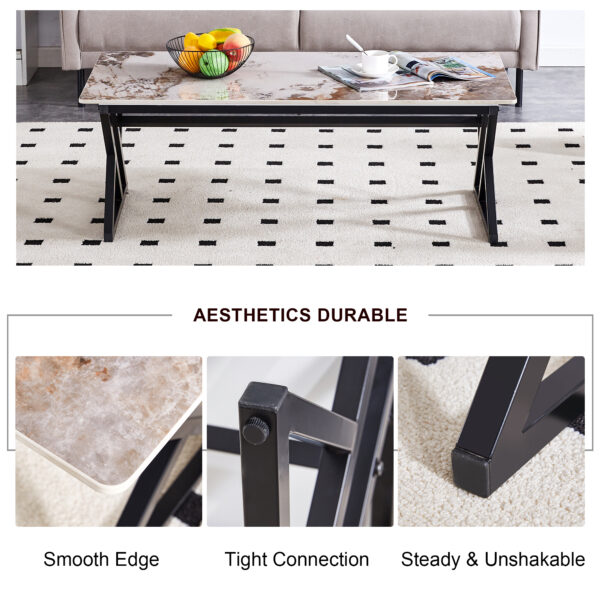 ee798a02b6ba4a4da8313e66fccd517a_3a903a2a027103de236d62c970c8877d A coffee table is made of rock slab material, with a natural and smooth marble pattern on the surface, which complements the modern design of the black metal legs and adds a touch of fashion.47*23.6