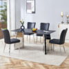 Table and chair set.63"x31.5x30" Black Marble-Patterned Slabs Tabletop with Stainless Steel Butterfly Legs.Paired with 4 Black PU dining chairs with a vertical stripe design on the backrest.