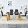Table and chair set.63"x31.5x30"Black Texture With Lines Patterned Sintered Stone Table with Golden Stainless Steel Butterfly Legs.Paried With 4 Black High-quality PU Chairs With Golden Metal Legs.