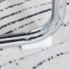 Table and chair set.63"x31.5x30" Luxurious Snow Mountain Patterned Sintered Stone Table with Silver Stainless Steel Butterfly Legs.Paried With 6 White High-quality PU Chairs With Arched Metal Legs.
