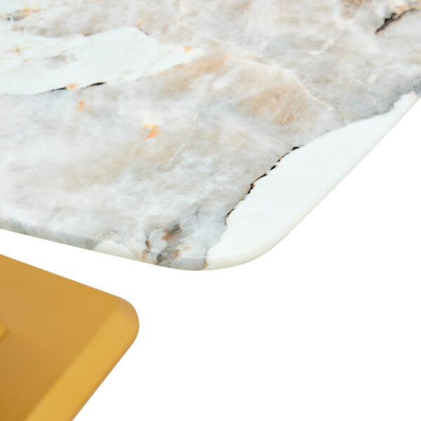 f1c9a17d1ed343b88d639133fb7dd0fa_5430432d28bce37a8b1892a6a910abe4 A modern minimalist dining table. Imitation marbled glass tabletop. Gold MDF table legs for kitchen and living room