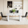 Table and chair set.63"*35.4" White Imitation Marble Pattern MDF Dining Table Set - 4 Black PU Chairs with a vertical stripe design on the backrest.Create Your Exclusive Low-Key Luxury Space.