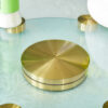 Double layer rotatable round glass.Golden aluminum plate,The rotatable design makes it convenient to retrieve and place items.The upper glass has a diameter of 24 inches, the lower glass15 inches.