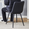 Extended Seat Cushion PU Black Dining Chair Set - Four Pieces,Ergonomic Design.Smooth line design,Integral metal leg structure,Can integrate well into various modern home decoration styles.