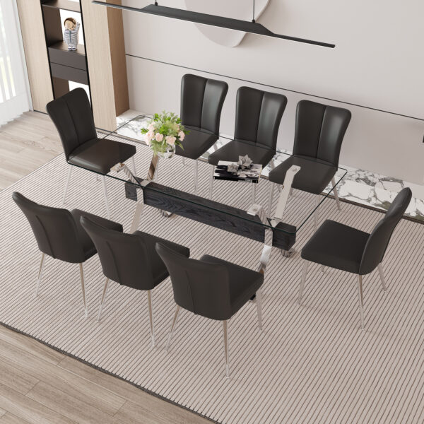 fd8caa0aafa5450a8610a0d350c3a20c_ae903c7767663cd3ae6c3584862e512f Table and chair set.Elegant Transparent Tempered Glass Dining Set - 71"x35.4" with 8 Black PU Chairs with a vertical stripe design on the backrest.