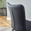Table and chair set.Modern Black Marble Pattern MDF Dining Set - 55"x31.4"with 4 Black PU chairs with a vertical stripe design on the backrest and black metal legs.Suitable for kitchen,Dining room,etc