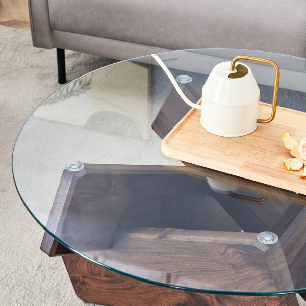 ffd4bece24ba4982a969615754b30501_f297b7cdd4204bd45d40e77446485859 Round glass coffee table, 33.4" modern design unique coffee table. Tempered glass top with Walnut colored texture sticker MDF legs. Suitable for living and dining rooms