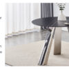 A 42-inch burn stone round table with stainless steel legs can accommodate 4 or 6 diners