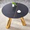 The 42-inch stainless steel gold-plated flamed granite round table with seating for 4 or 6 people is perfect for dining, entertaining, or as a conference table