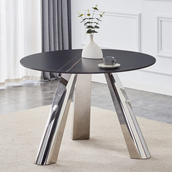 13b9f494526d40c3995a2fd7f3e64718_86b666f59c88a6fcf9c404a79a29ae09 A 42-inch burn stone round table with stainless steel legs can accommodate 4 or 6 diners