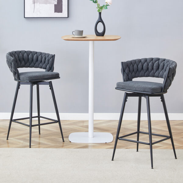 2d34c1a29e0b46399821d7844522279f_4fa34fd89ee6b86127fd87f4a22ba27e Two sets of rotating high-legged stools with breathable cotton and linen cushions, Dark gray seats paired with black spray-painted iron frames, suitable for both restaurants and bars