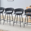 Two sets of rotating high-legged stools with breathable cotton and linen cushions, Dark gray seats paired with black spray-painted iron frames, suitable for both restaurants and bars
